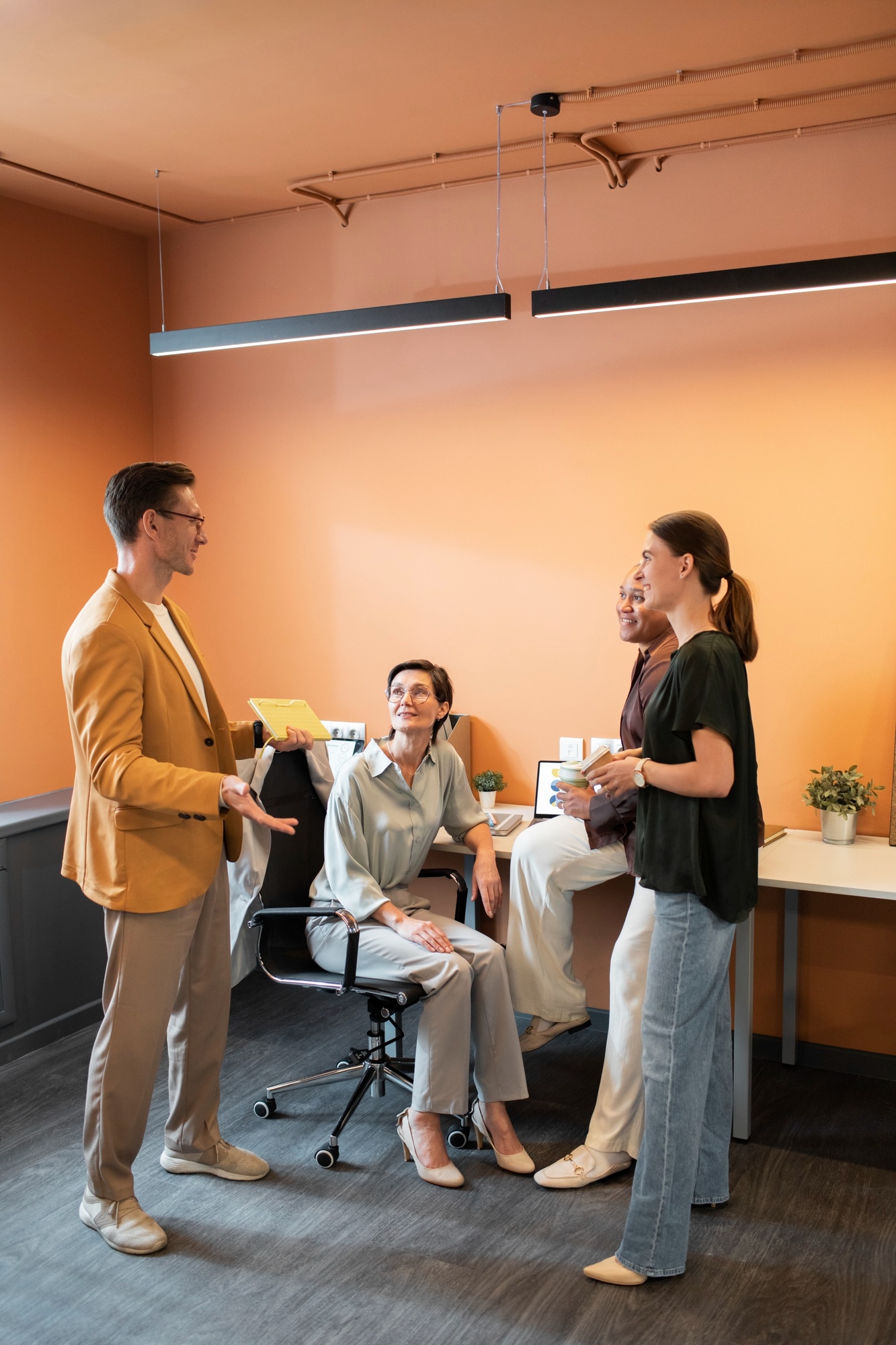Team collaborating in a discovery meeting around a shared workspace