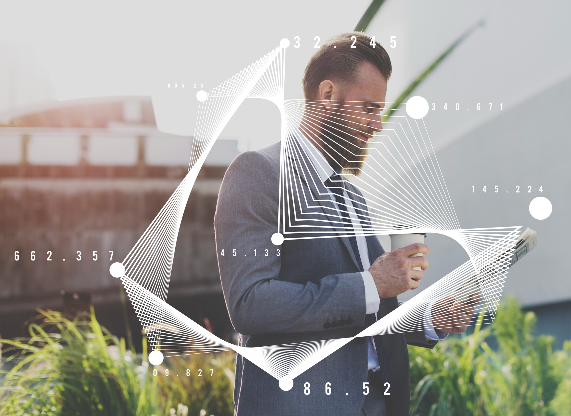 Professional holding a phone with a holographic target strategy visualization