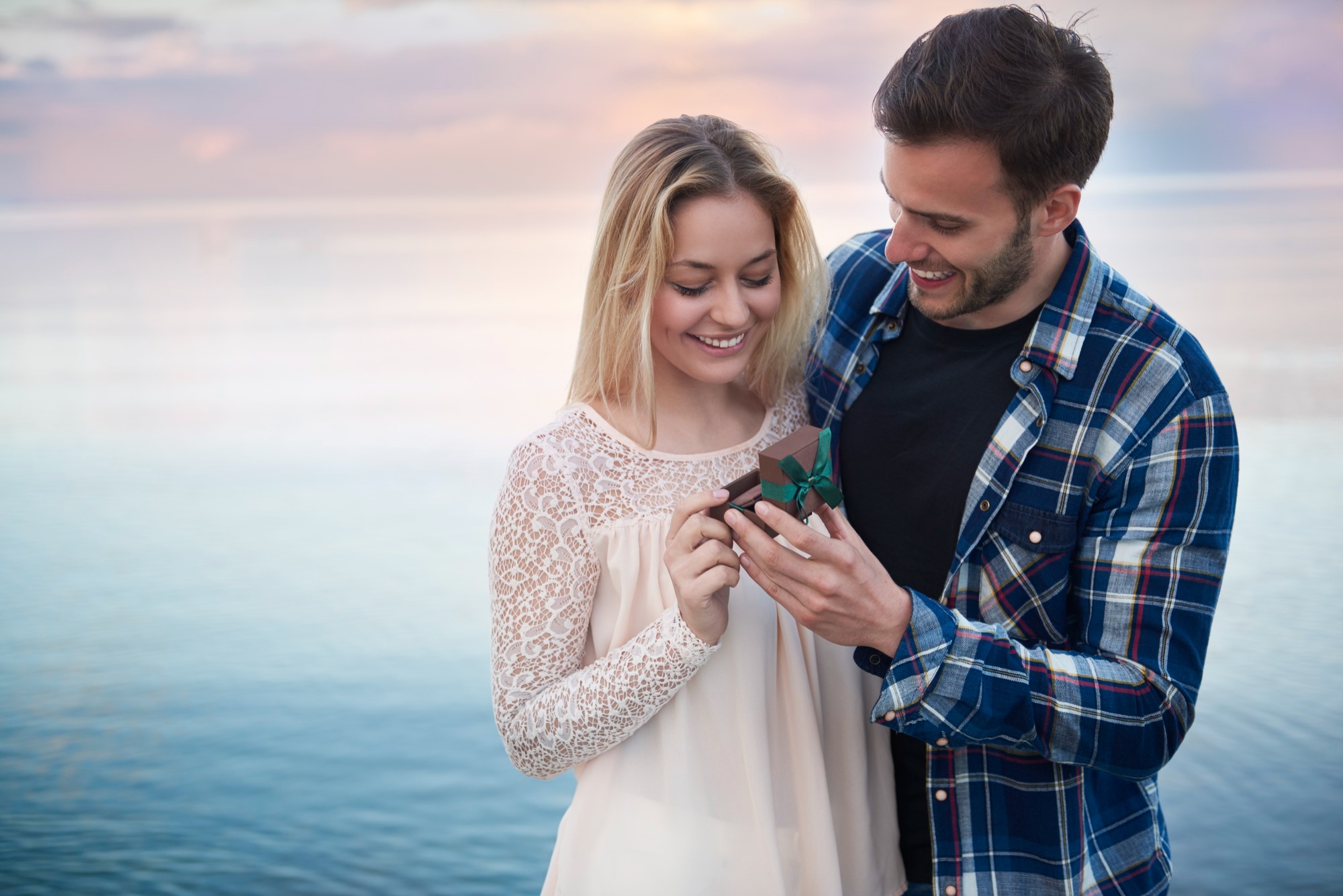 Couple using a dating app profile experience on a smartphone