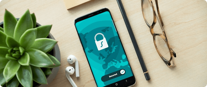 Smartphone showing a secured lock screen on a desk