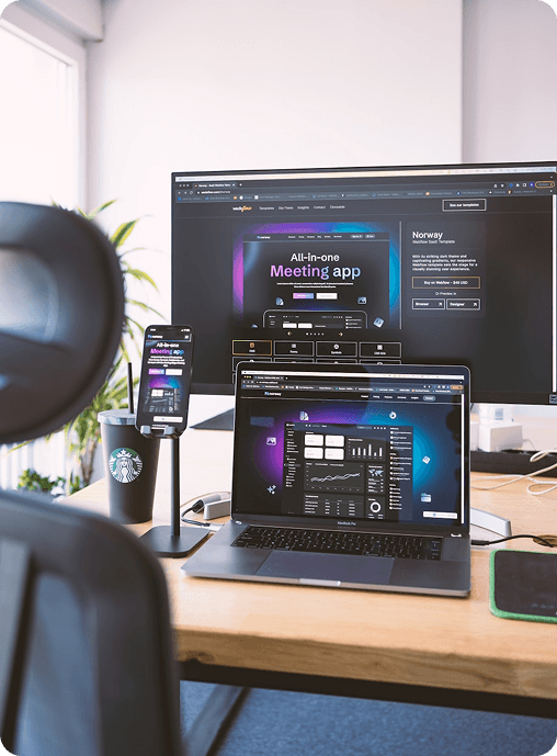 Cross-platform streaming app interfaces displayed on a monitor, laptop, and phone