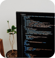 Developer reviewing fitness app source code on a monitor