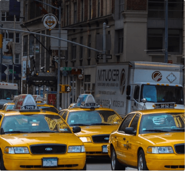 Yellow taxis on a busy city street