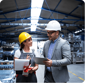 Factory engineers reviewing production data