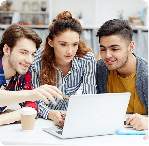 Students collaborating on a laptop