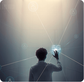 Silhouette viewing a glowing digital network mesh
