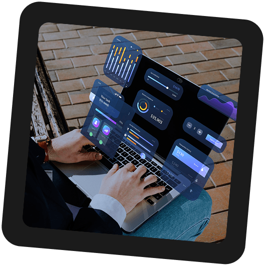 Laptop dashboard with analytics charts, transactions, and order management widgets