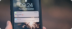 Smartphone showing educational push notifications