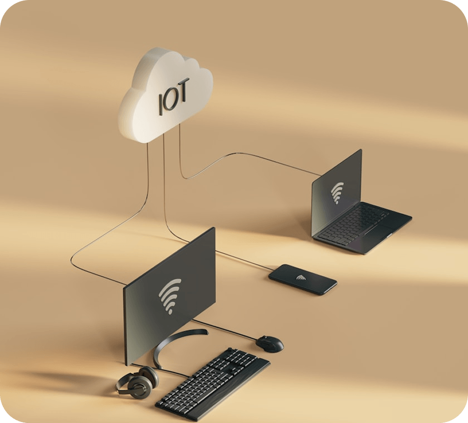 Connected IoT devices on a desk with a laptop