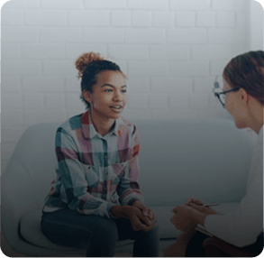 Psychiatrist speaking with a young patient