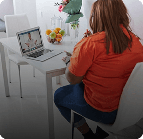 Person on a video call with a fitness coach