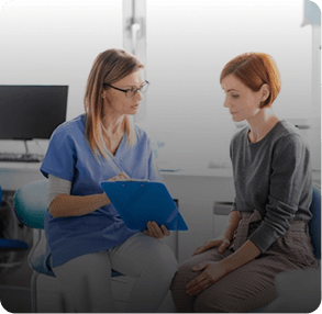 ENT specialist reviewing notes with a patient