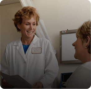 Dermatologist consulting with a patient in a clinic