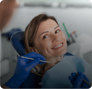 Patient smiling during a dental examination