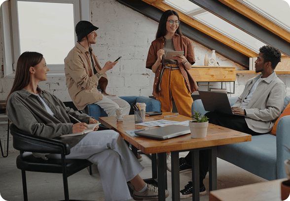 Design team collaborating in a bright modern studio space