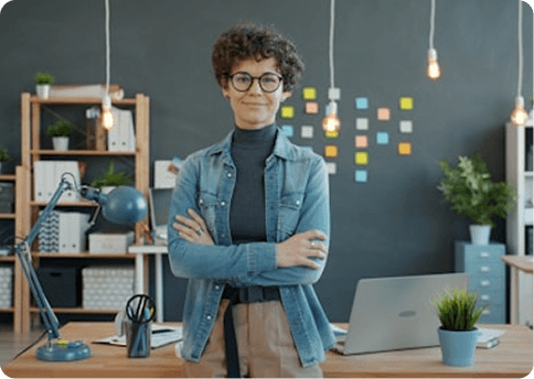 Professional woman standing with arms crossed