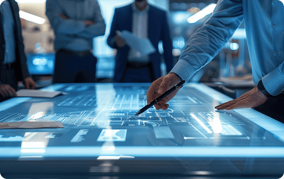 Hand interacting with a glowing digital blueprint on a touch table
